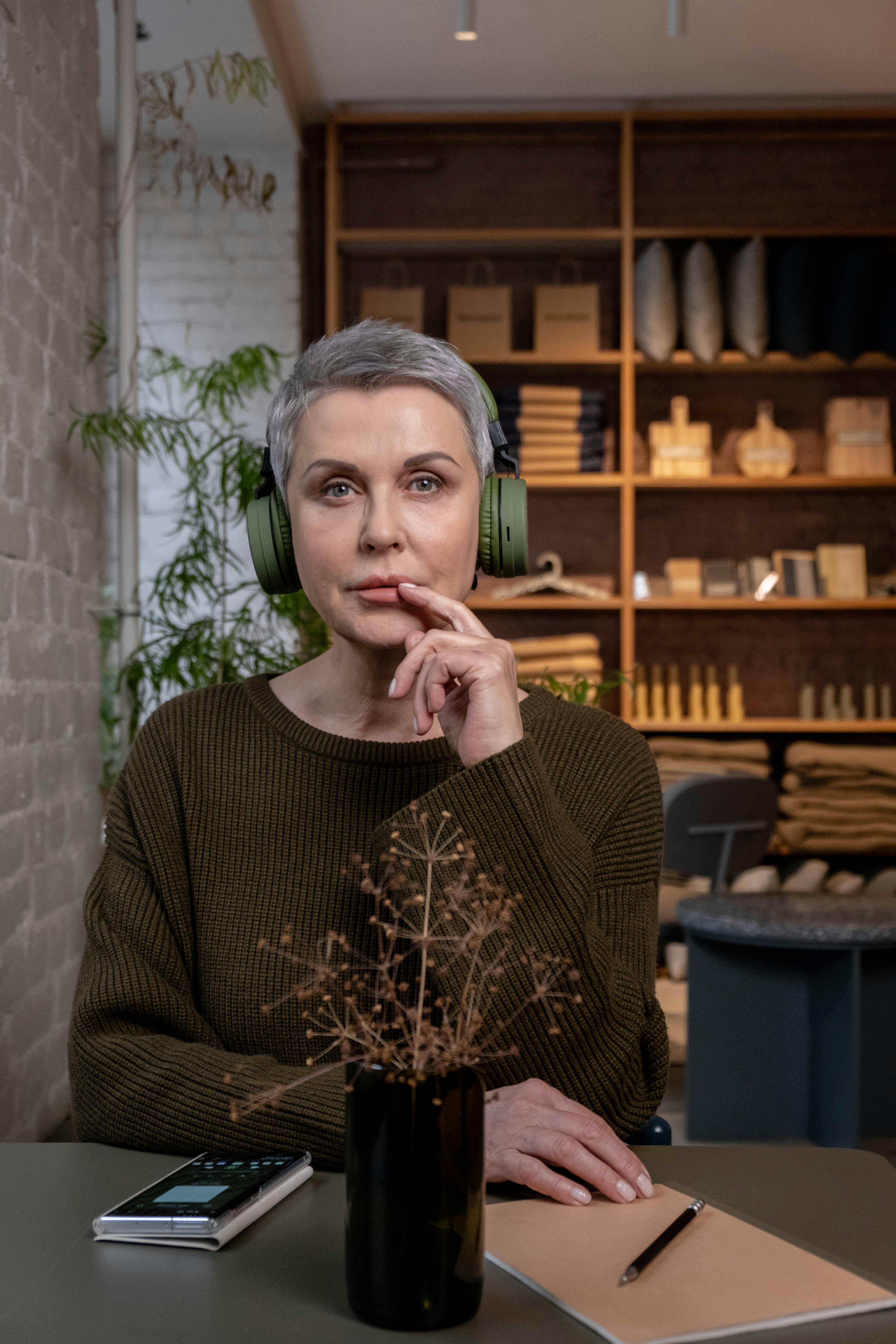 short hair woman wearing a headphones