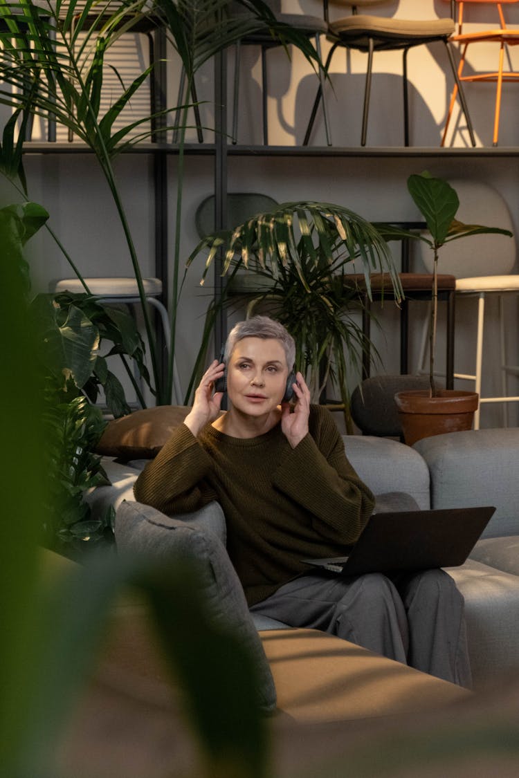 Photo Of An Elderly Woman Listening To Music