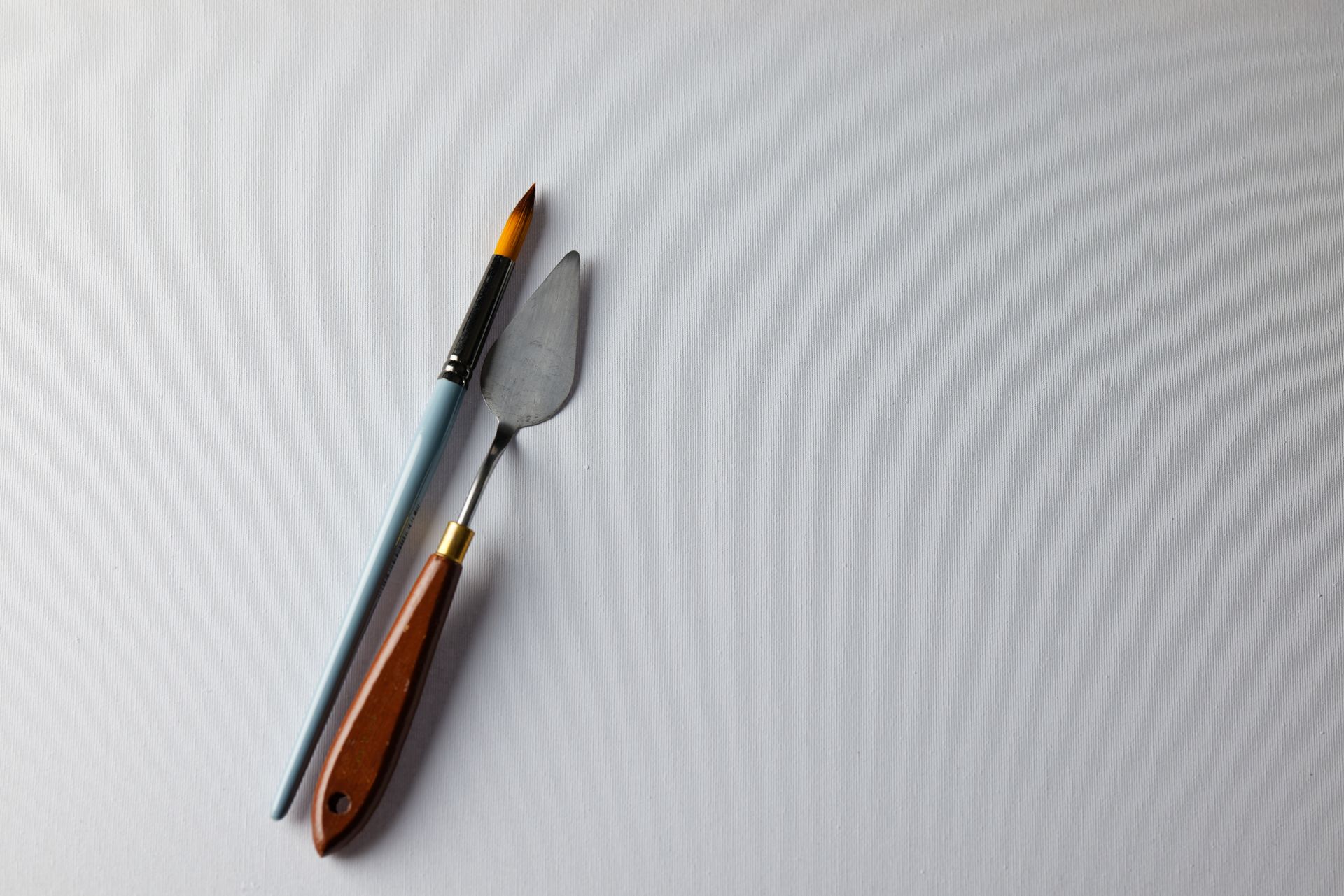 A Chisel and Scraper with Wood Handle