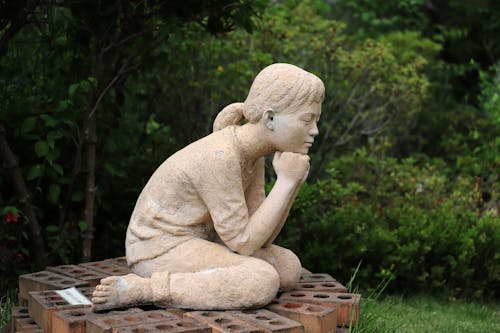 Woman Sculpture in Park