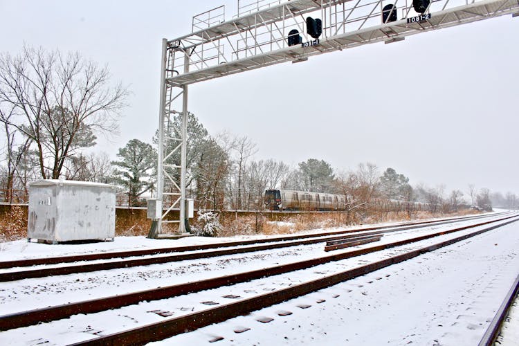 Railroad Tracks In Snow