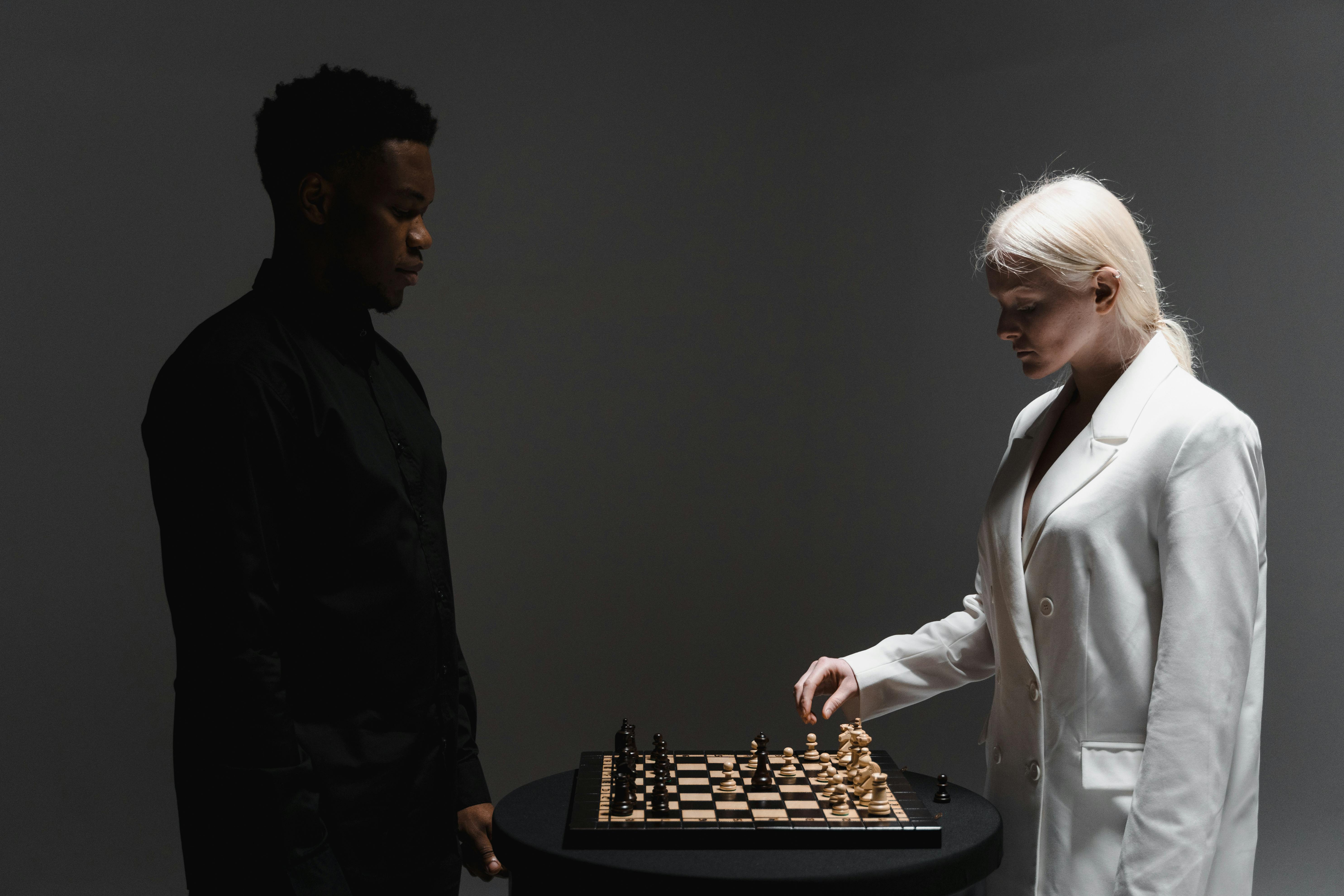 Two business women play chess hi-res stock photography and images - Alamy