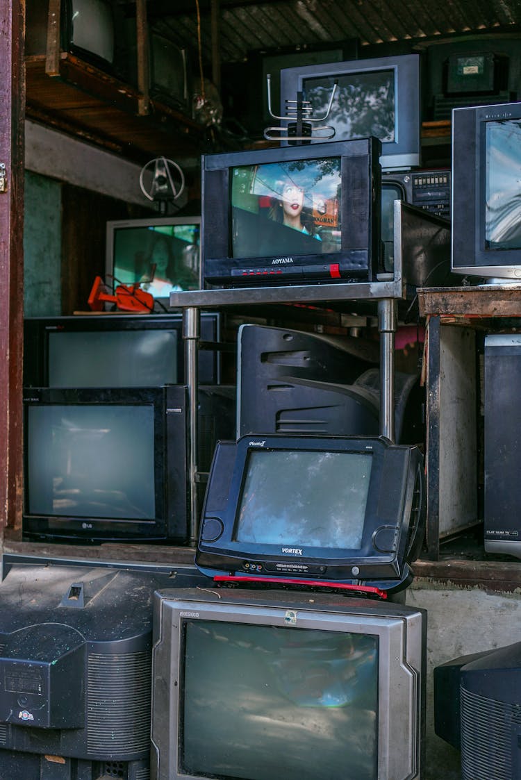 Used Televisions On A Junk Shop