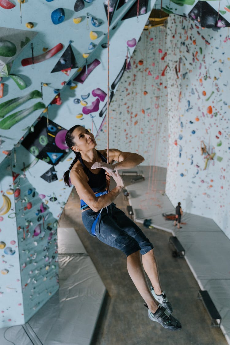 Woman Hanging On A Rope