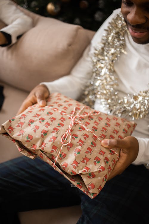 Man Holding Christmas Present