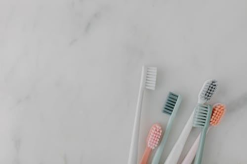 Free Close Up Photo Of Toothbrushes Stock Photo