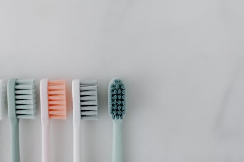 Free Close Up Shot Of Toothbrushes Stock Photo