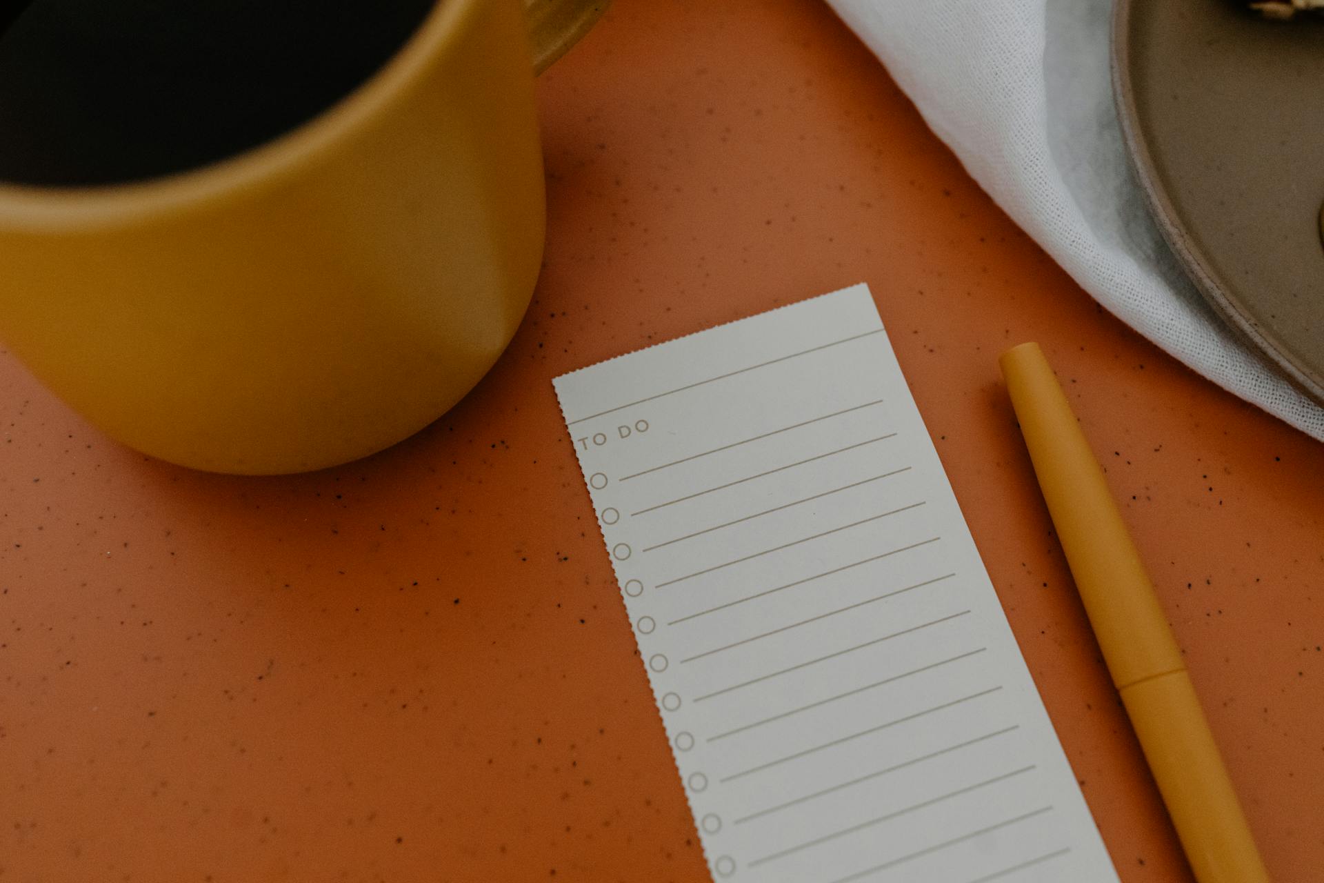 To Do List On Orange Surface