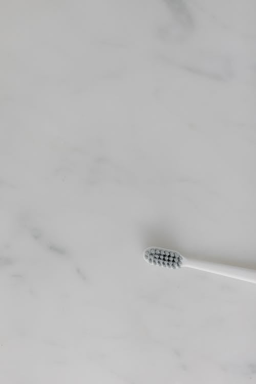 A Toothbrush on a Marble Surface