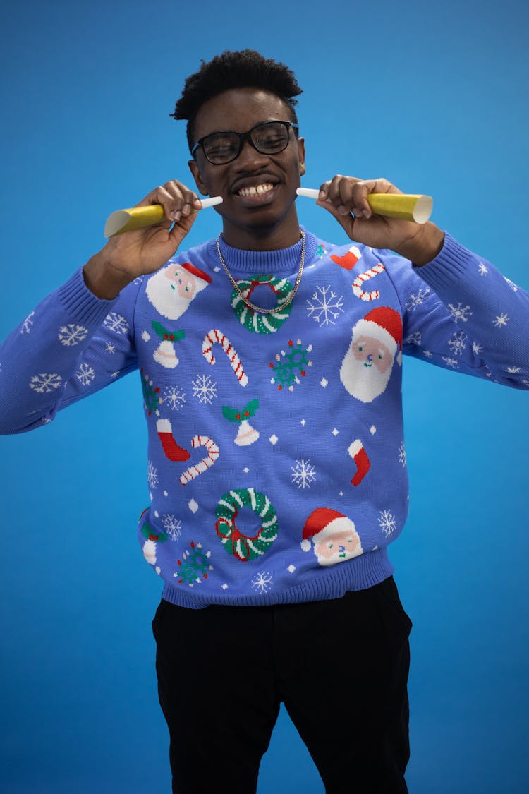 Portrait Of Man Wearing Christmas Sweater