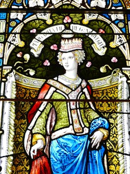 Intricate stained glass window depicting Queen Margaret at Lerwick Town Hall, Scotland.