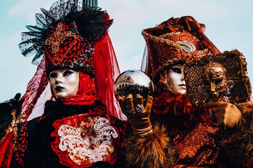 People in Their Colorful Venetian Carnival Costume