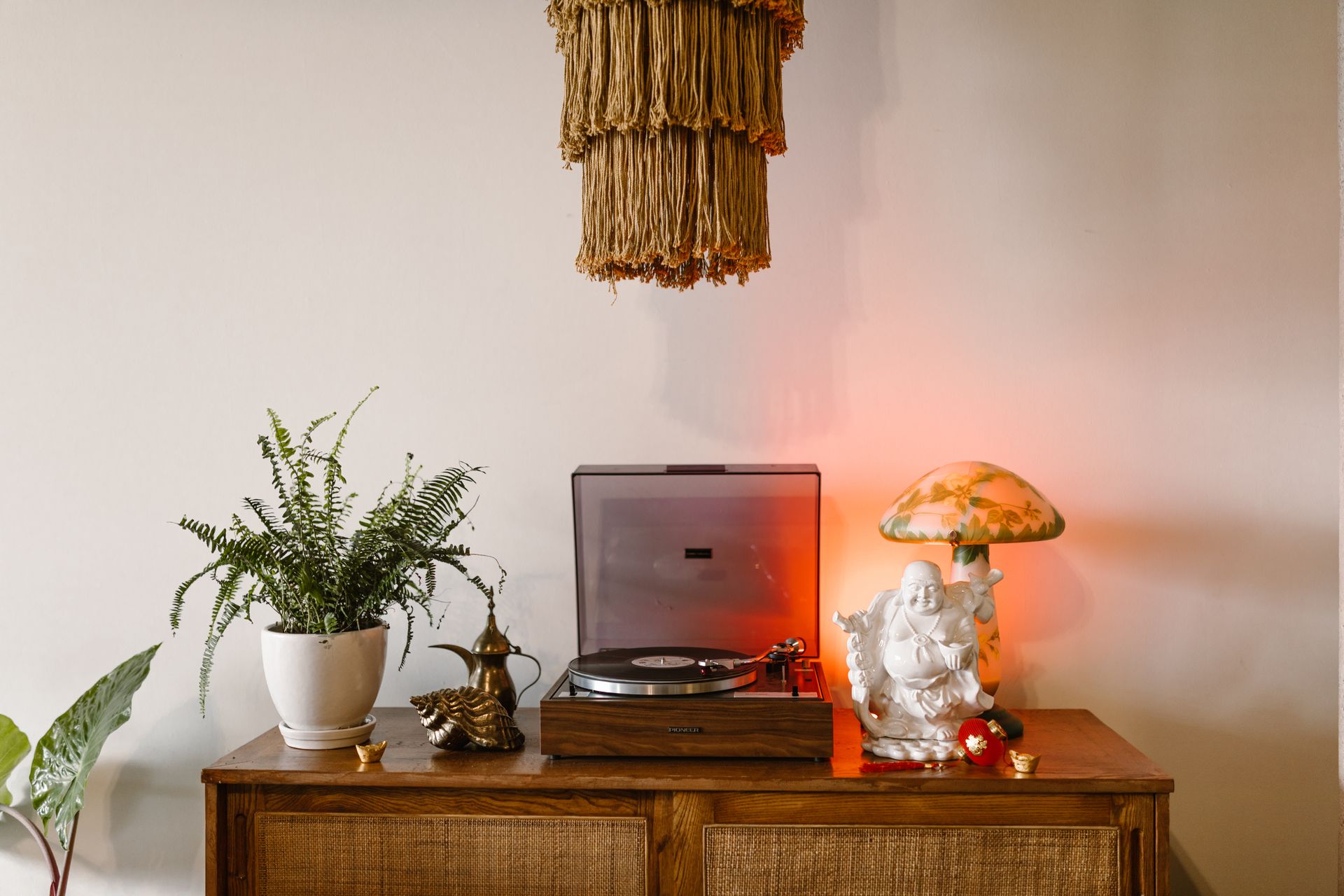 Home Decors Beside a Turntable Phonograph
