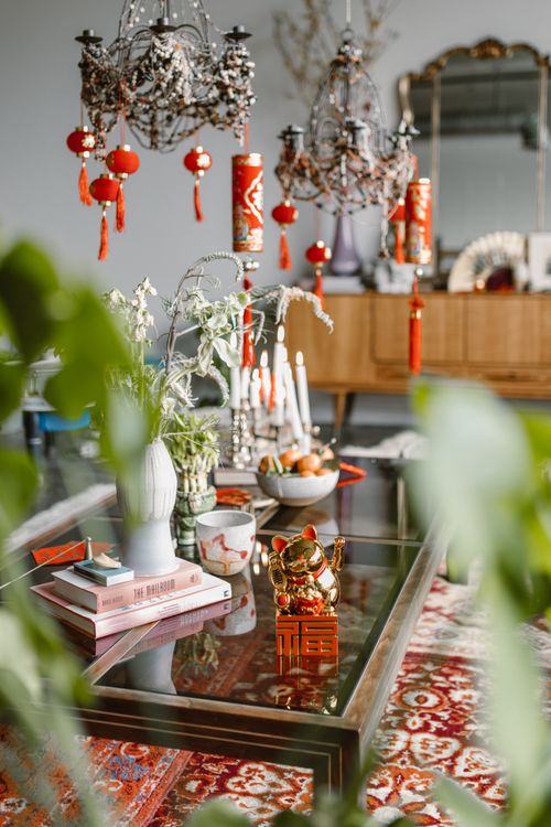 Free A beautifully decorated room for Chinese New Year with elegant lanterns and festive table setting. Stock Photo