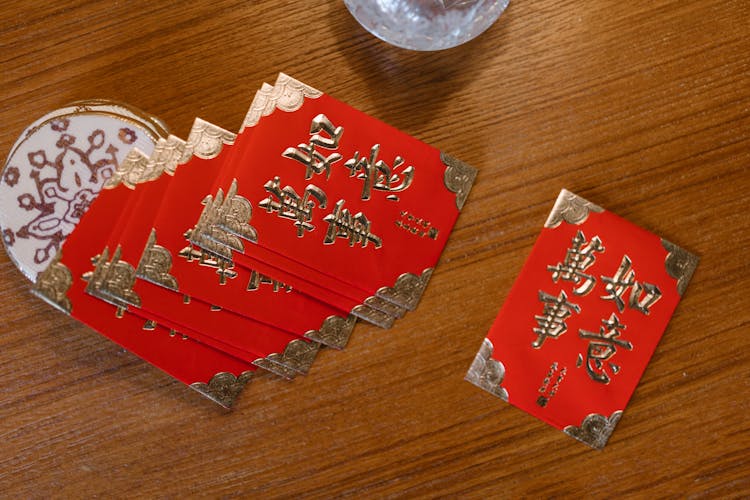 Close Up Photo Of Red Envelopes