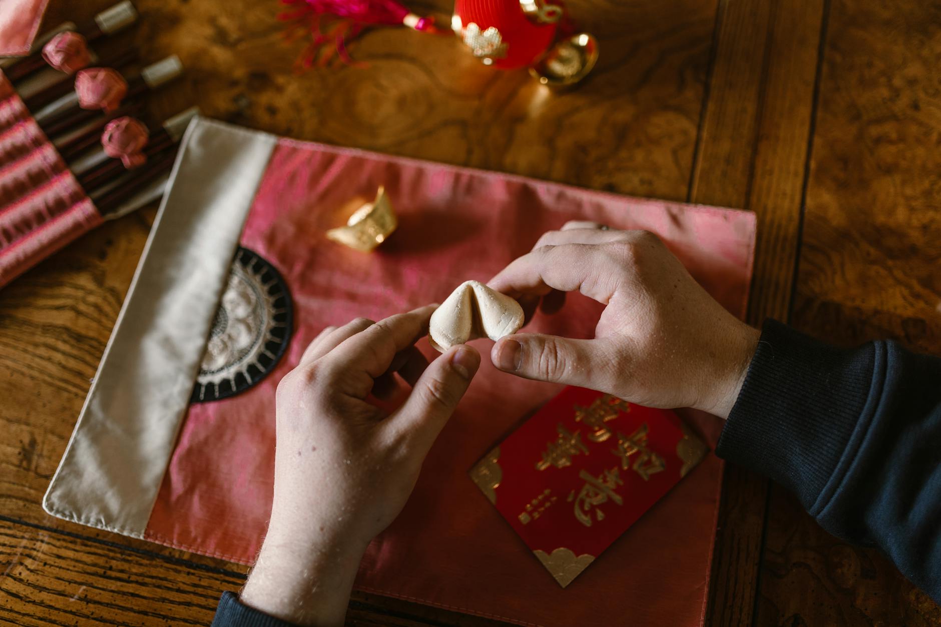 Stack of chocolate-studded Chinese almond cookies on a ceramic plate