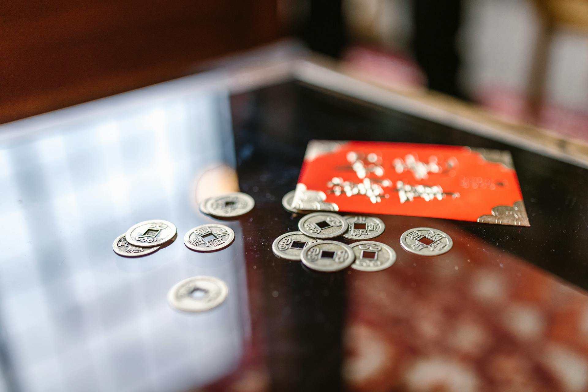 Coins beside a Red Envelope