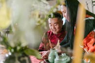 A Woman Serving Tea to Her Husband