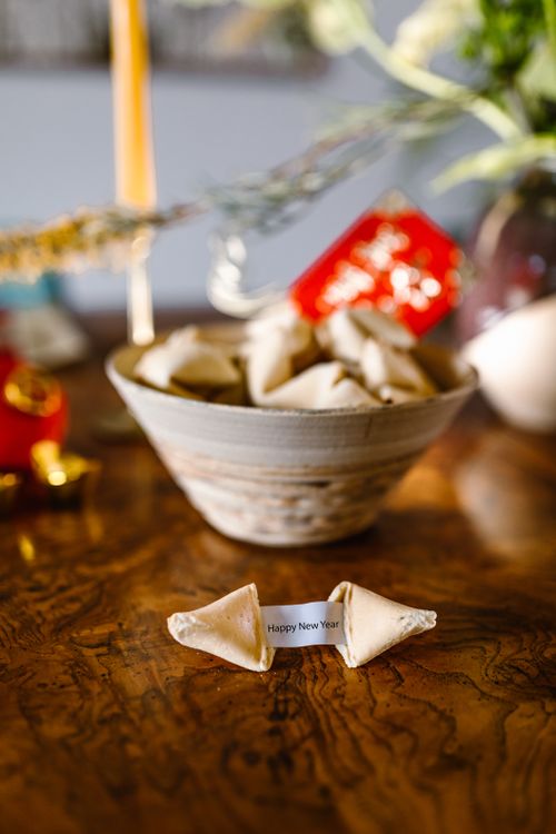 Free Close-up of fortune cookies with 'Happy New Year' message, perfect for festive themes. Stock Photo