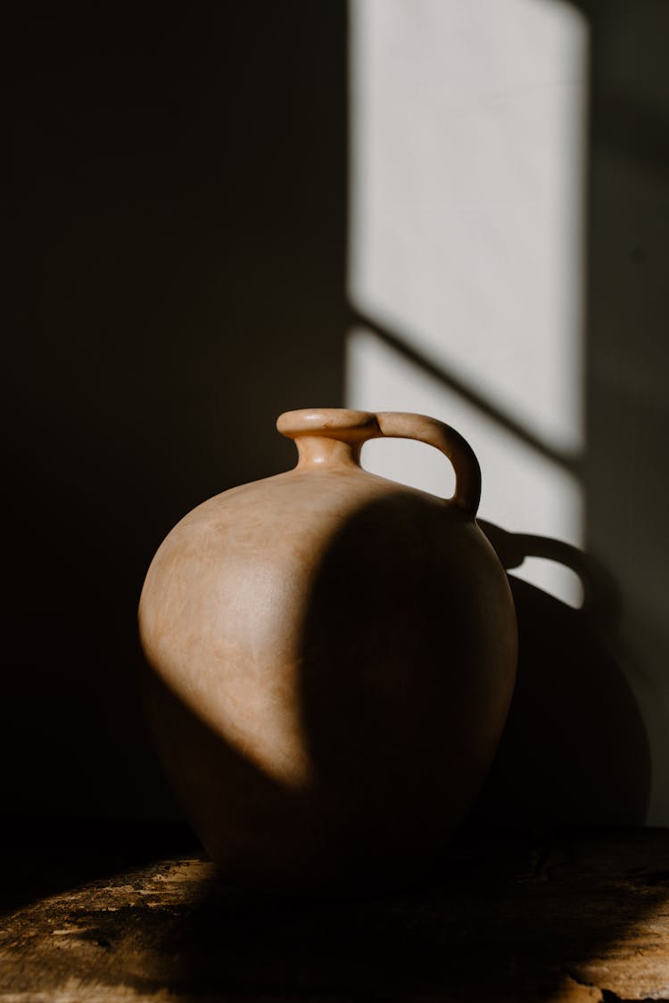 
A Close-Up Shot Of A Clay Jar