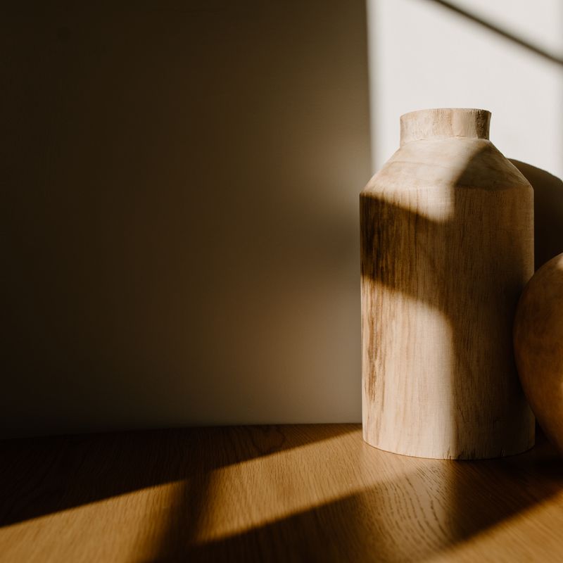 Corner with ceramic vases in soft shadow