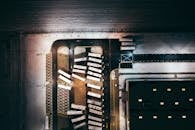 Aerial View of Buses Near a Concrete Building