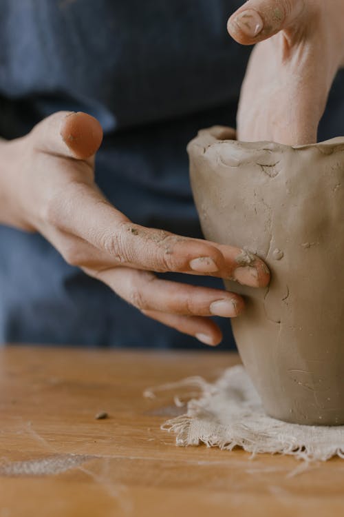 Free Person Holding White Ceramic Vase Stock Photo