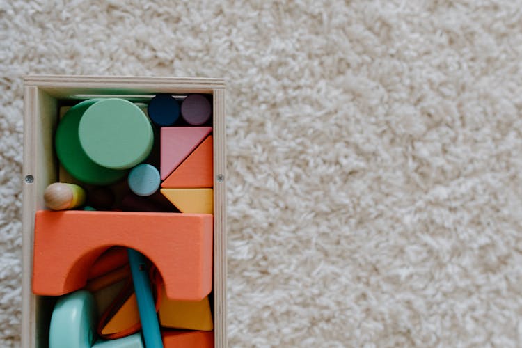 Colorful Wooden Toys In A Box