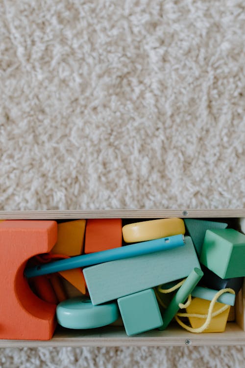 A Box of Colorful Wooden Toys