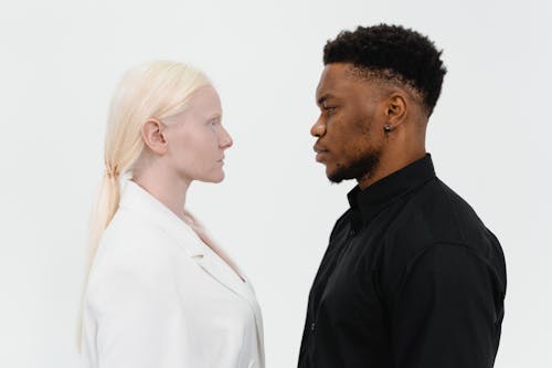 Man and Woman Standing Face to Face