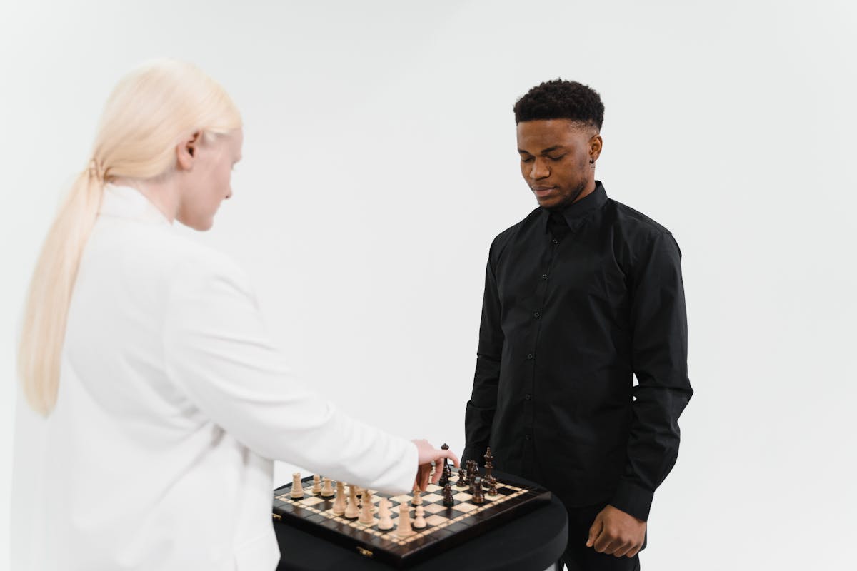 Man and Woman Playing Chess