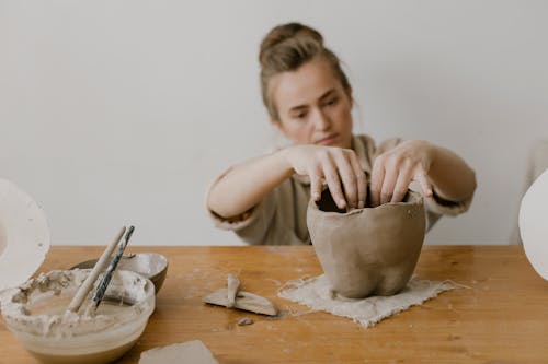 
A Woman Doing Pottery