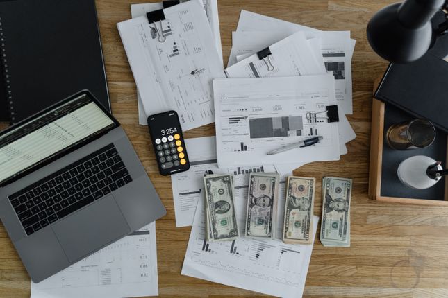 Person checking banking and payment details on a laptop