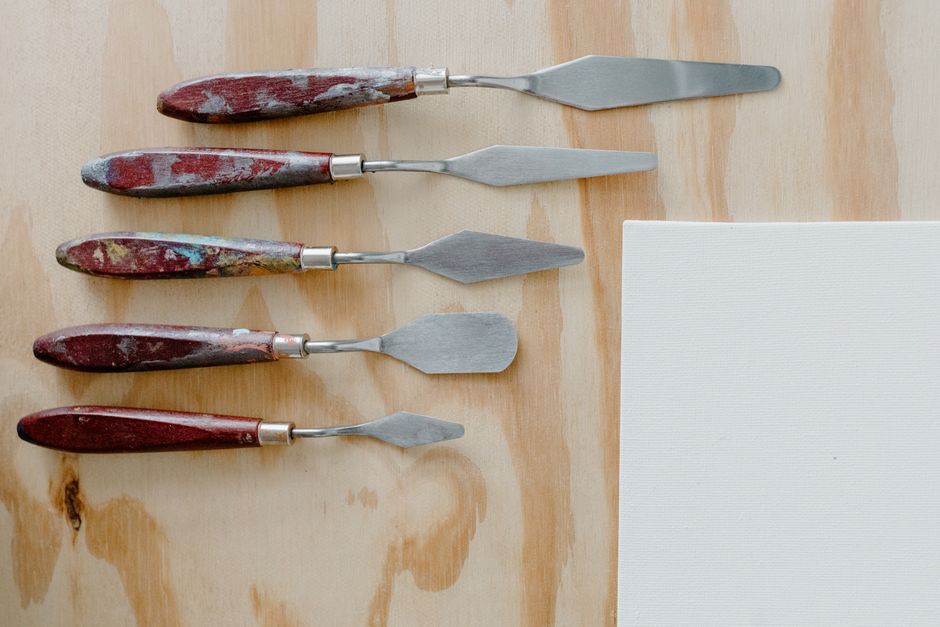 A knife lays paint down in slabs, which is the fastest way to cover a large area with texture