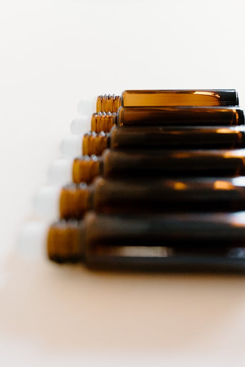 Free Brown Roller Bottles in Close Up Photography Stock Photo