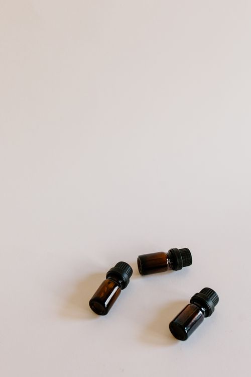 Brown essential oil bottles arranged