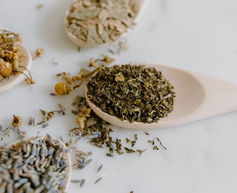 A selection of natural sleep enhancement ingredients including chamomile and valerian root