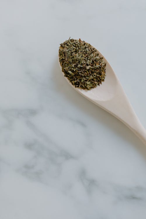 Dried Herb on a Wooden Spoon 
