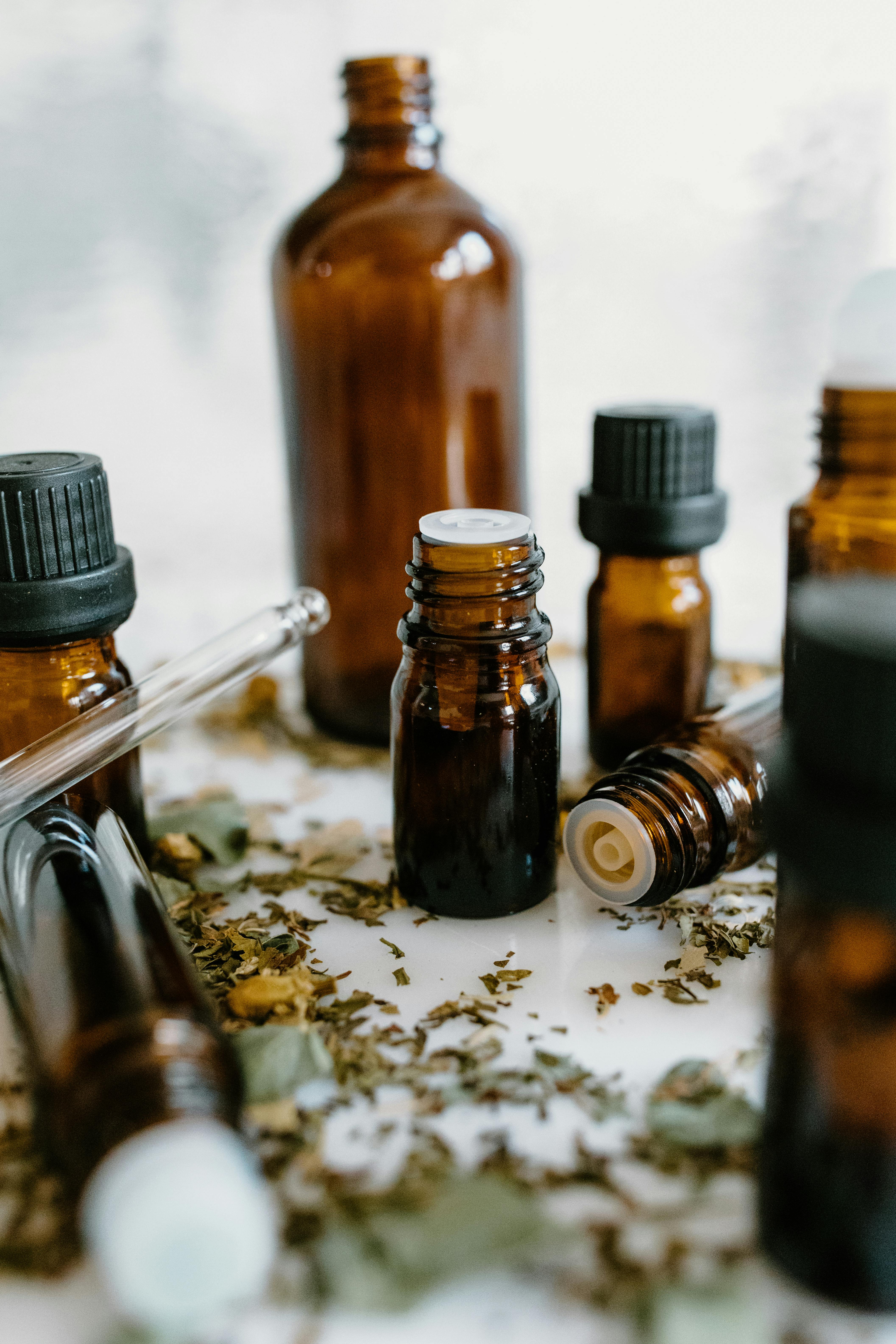 Apple essential oil in beautiful bottle on table Stock Photo by ©Solstzia  310657404