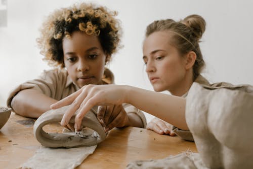 Two Women Working with Clay