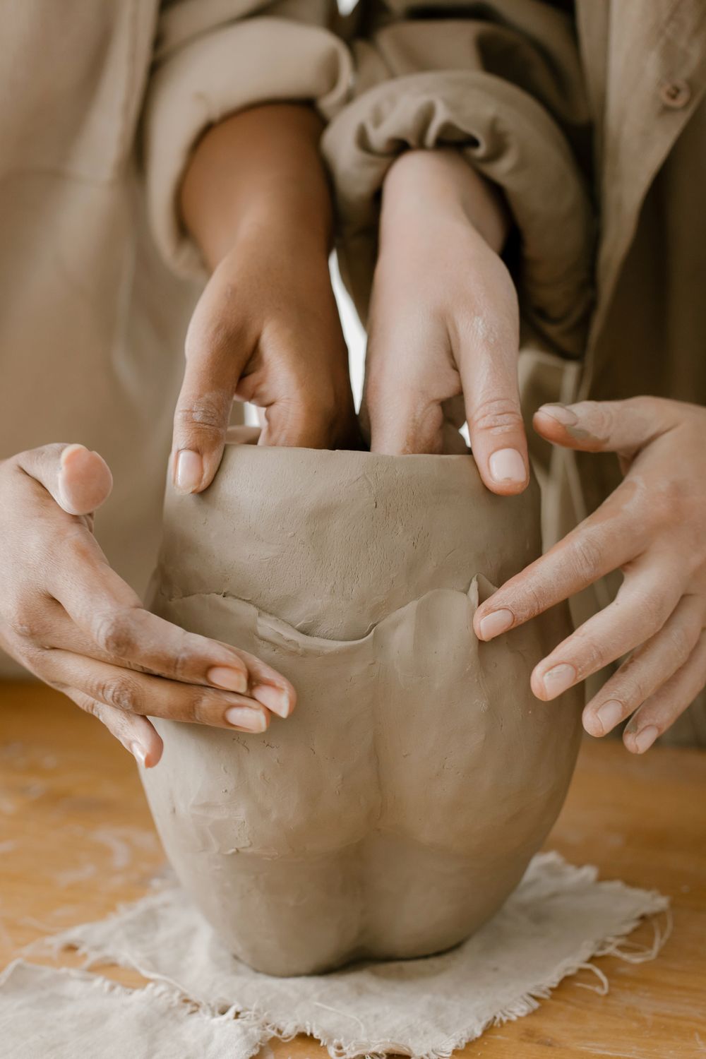 Person Using Clay A Close-Up Shot of People Molding a Clay · Free Stock Photo