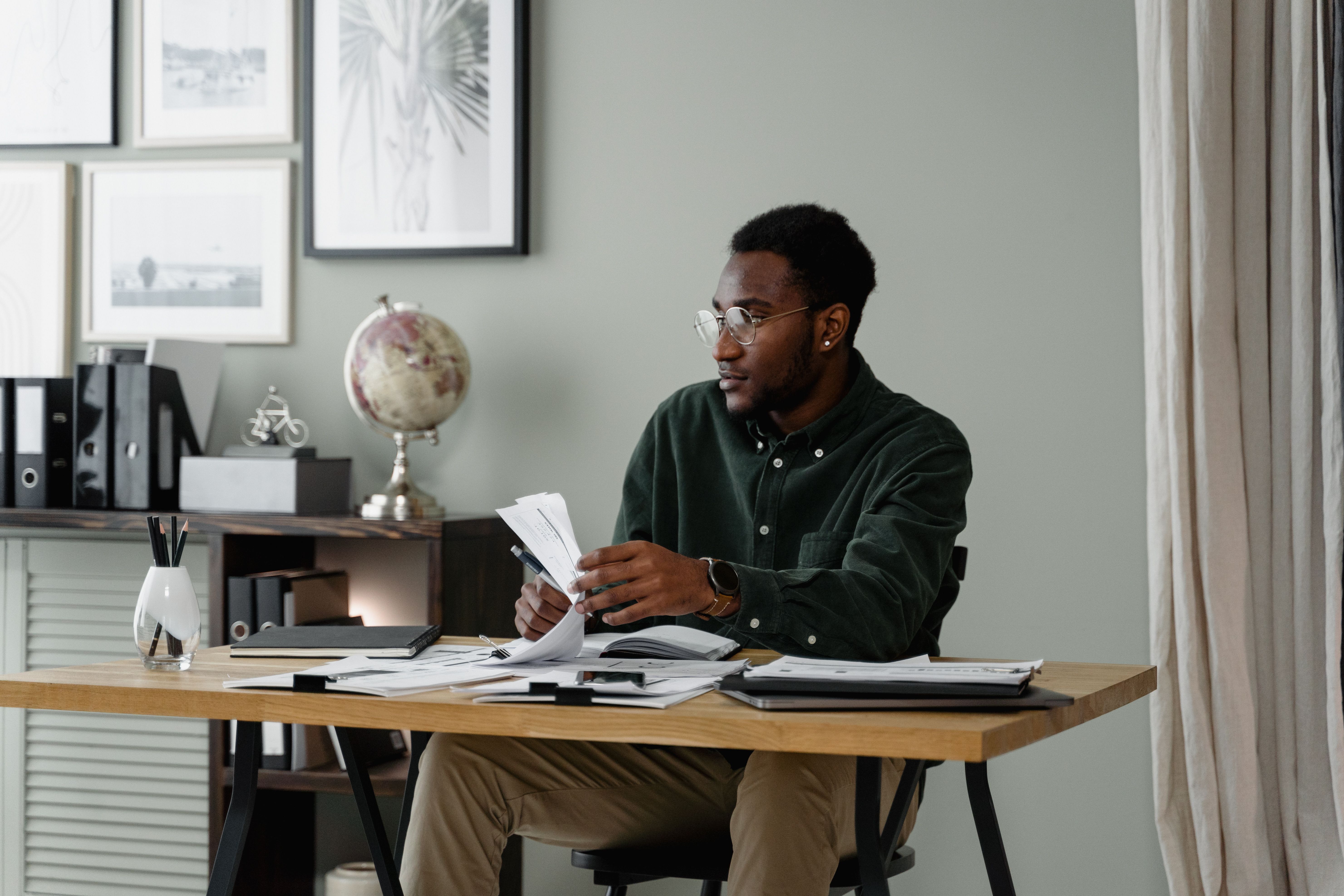 Professional examining financial records and timelines closely