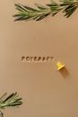 Etched Rosemary Word on Brown Surface