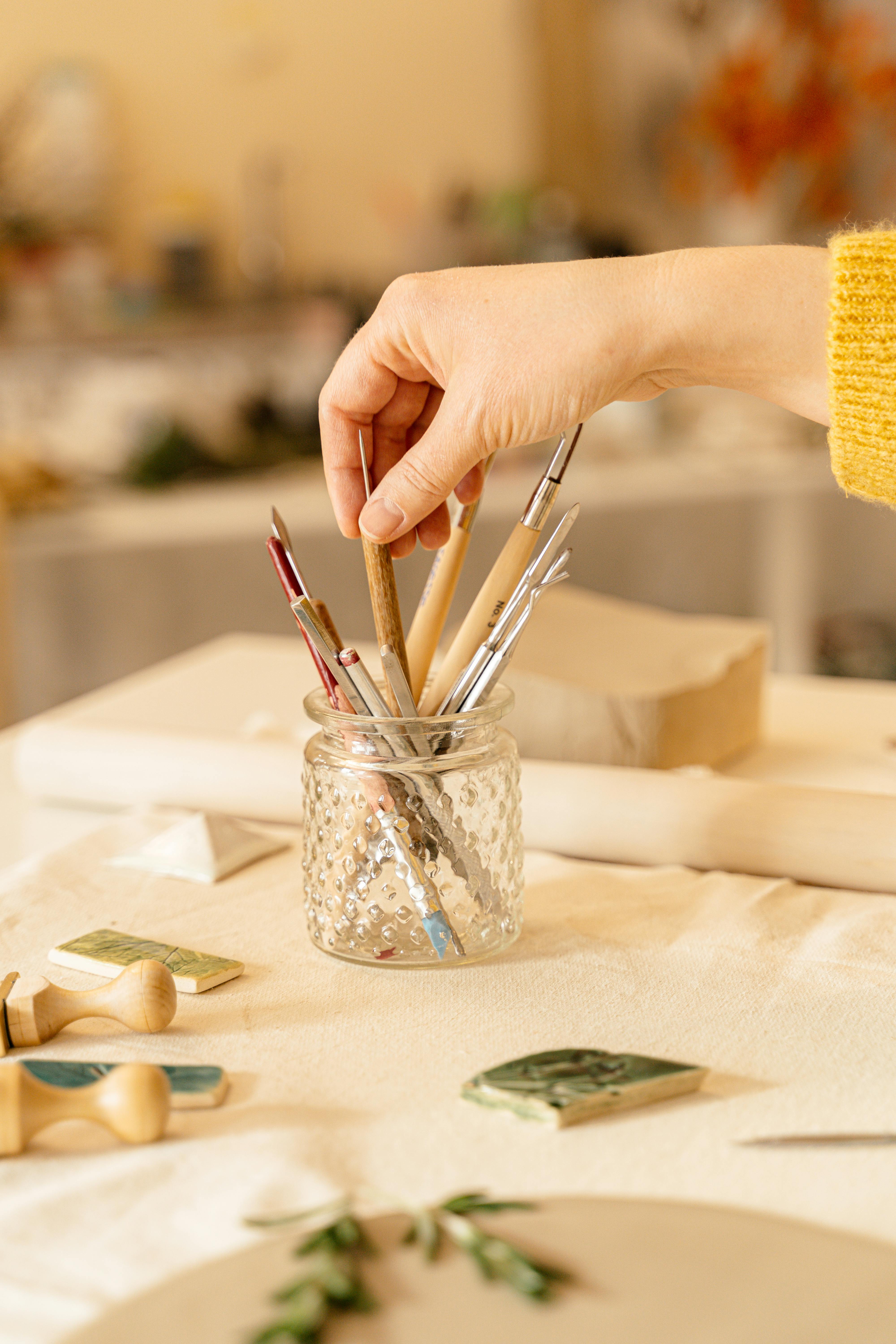 Assorted Colors of Sticks on Glass Lot · Free Stock Photo