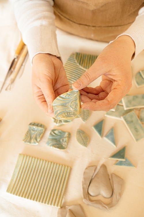 Woman Making Decorations from Clay 