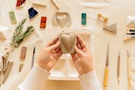 A Clay Molded in a Shape of a Heart