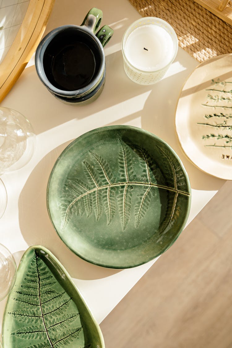 Beautiful Ceramic Plates With Leaves Imprint On Them