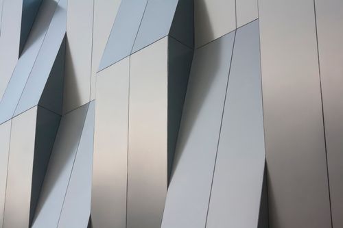 Free Detailed view of a modern geometric metal facade in Aguascalientes, Mexico. Stock Photo