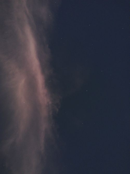 Free Ethereal night sky with scattered stars and clouds in Toluca, Mexico. Stock Photo