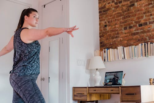 Woman Doing Online Yoga Class